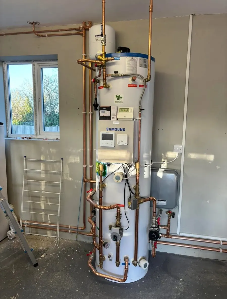 Samsung heat pump hot water cylinder with copper pipework and controls
